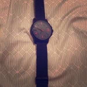 Black steel mesh watch.